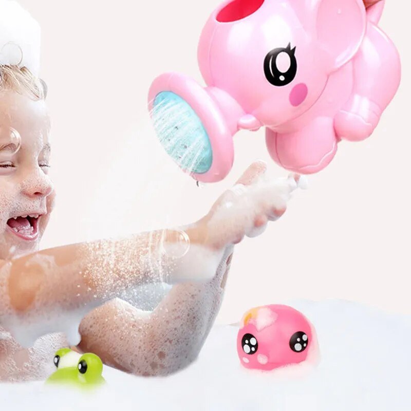 Baby playing with a pink elephant bath spray toy in a bubbly bathtub for fun bath time.
