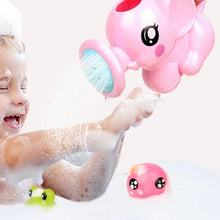 Baby playing with a pink elephant bath spray toy in a bubbly bathtub for fun bath time.