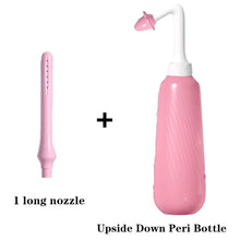 Pink extended nozzle peri bottle for perineal recovery after birth, giving targeted and comfortable rinsing.