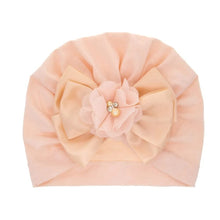 Pink floral and pearl embellished baby turban cap for special occasions, gifting, and dressy baby outfits.