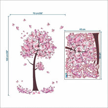 Size measurements for the pink flower tree wall decal to plan wall coverage before applying in a nursery.