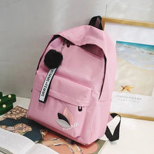 Pink Kawaii Harajuku backpack with black pom-pom charm for cute daily school carry and casual weekend use.