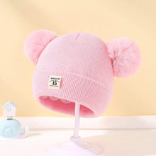 Pink Warm Knitted Baby Beanie with two pom poms for baby girl winter dressing and cosy outdoor walks.
