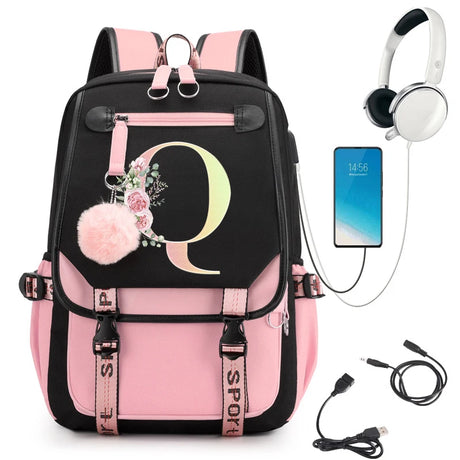 Pink and black backpack with floral 'Q' design, smartphone, headphones, and USB cable.