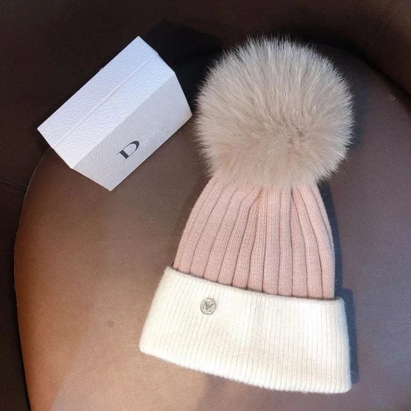 Pink mink pom pom wool beanie for girls winter outfits, giving ear warmth on school mornings and park visits.