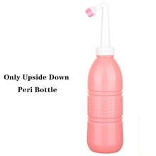 Pink peri bottle with white tip for postpartum perineal washing as part of daily recovery care.