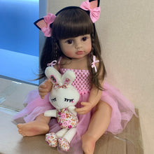 Pink Reborn Princess doll with soft silicone body and bunny hood, a bathable toy doll for water play and everyday pretend care.