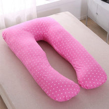Sleeping Support Pillow in Spot Pink for pregnant women wanting cushioned side sleeping and bump support.