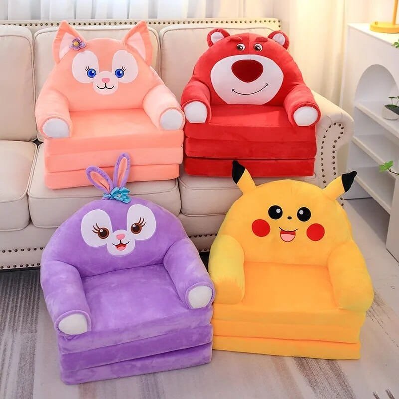 Four plush stuffed animal baby support seats in cartoon designs shown on a couch for comparison.