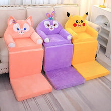 Three plush stuffed animal baby support seat styles arranged on the floor for style comparison.