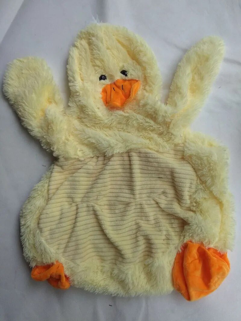 Plush duck baby seat sofa with orange feet and beak, a soft animal chair for toddler seating and playroom decor.