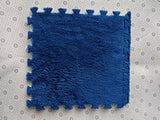 Blue textured square mat.