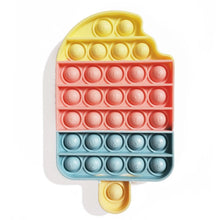 Colorful pop-it toy shaped like a popsicle on a white background
