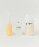 Two bottles of skincare products.