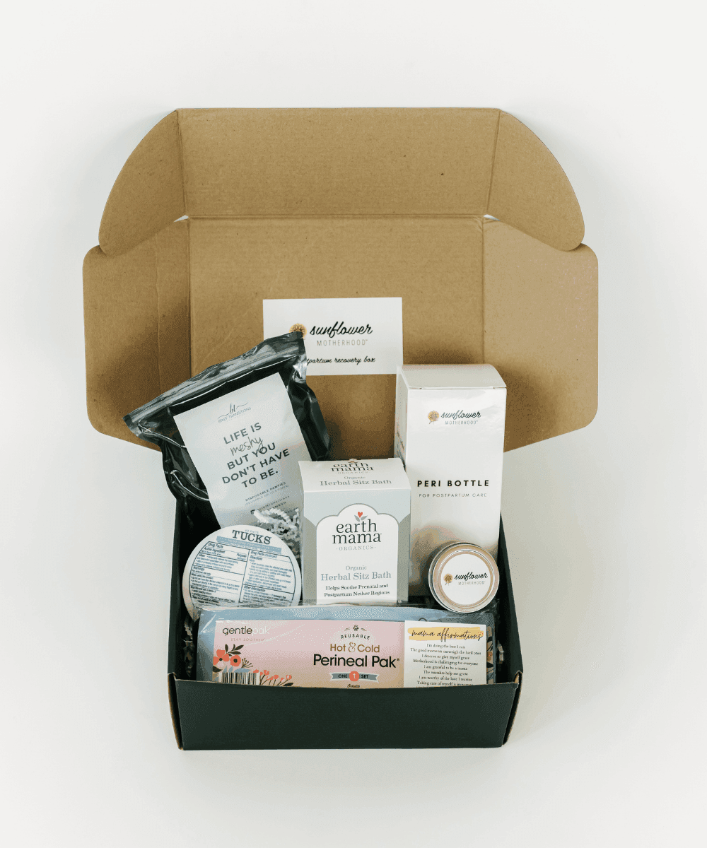 Open the cardboard box containing various items.