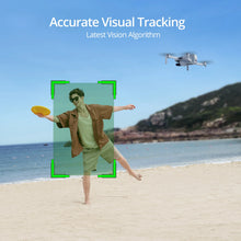 Potensic C0 ATOM mini drone tracking a person on the beach with accurate visual tracking technology.