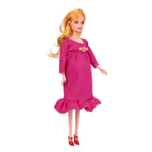 Pregnant mommy doll in a pink dress for pretend play, storytelling and sibling preparation.