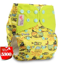 Yellow children's diaper with a pirate and sea creature pattern.