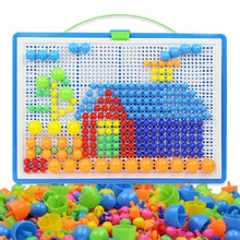 Colorful magnetic bead board with train design and additional beads.