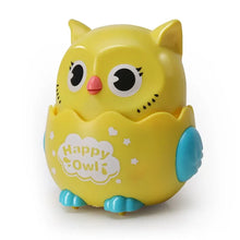 Yellow Happy Owl toy with teal wings on a white background