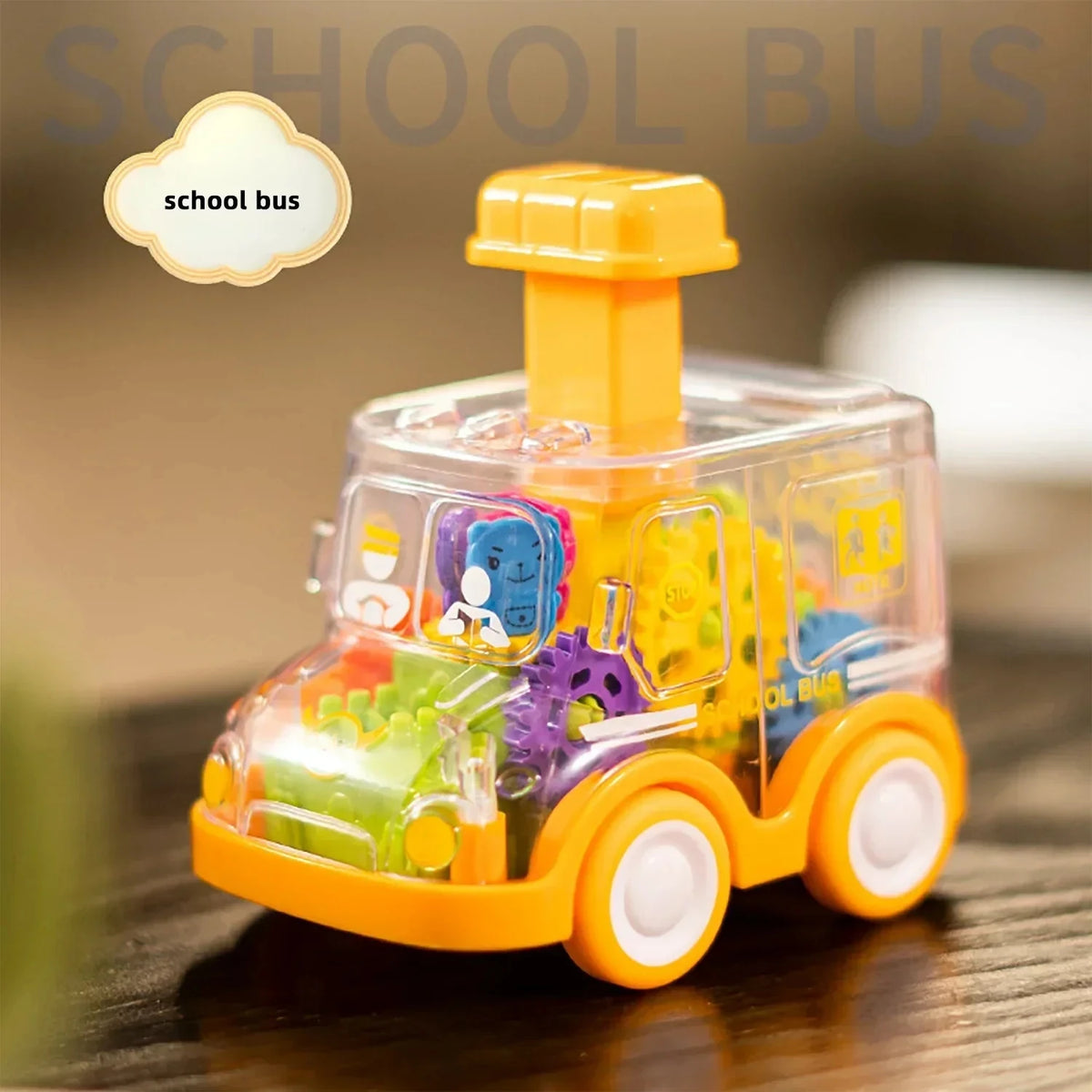 Yellow school bus transparent gear toy car, second view