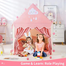 Two children playing inside the princess castle teepee playhouse tent during indoor playtime.