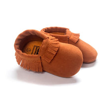 PU suede leather newborn baby moccasin shoes shown at an angle to highlight the soft suede finish.