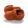 PU suede leather newborn baby moccasin shoes shown from the front for everyday soft-sole wear.