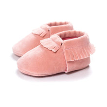 Pair of PU suede leather newborn baby moccasin shoes displayed together for nursery gifting.