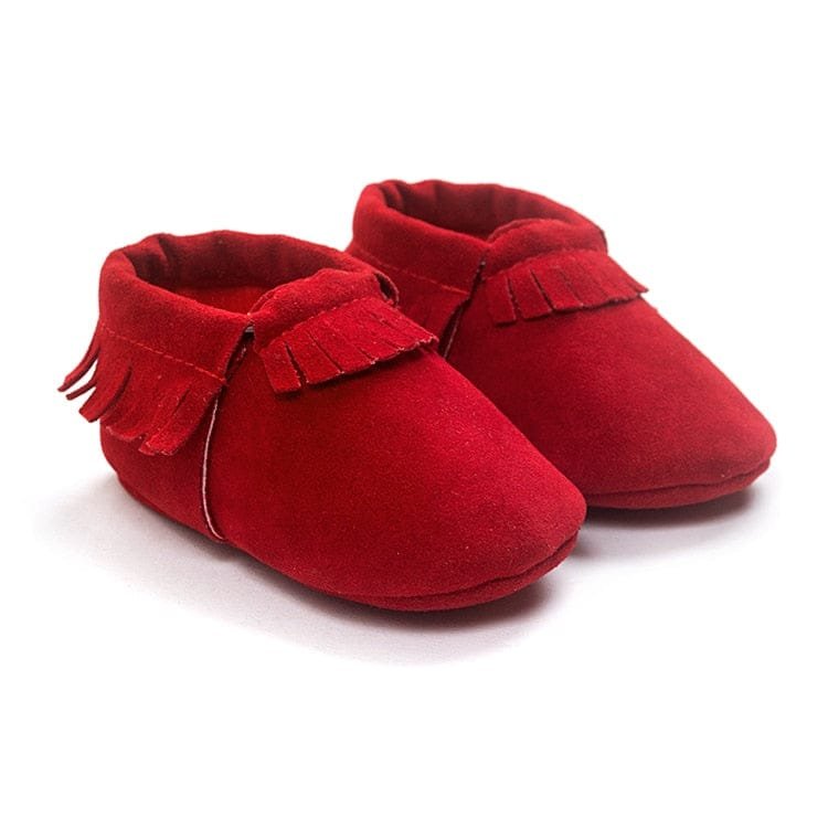 PU suede leather newborn baby moccasin shoes standing display for nursery photos and gifting.