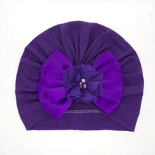 Shiny Rhinestone Bowknot Baby Turban in purple with flower and bead detail for family events.