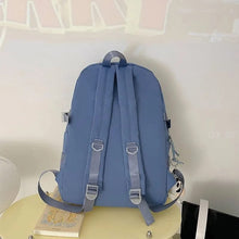 Purple high school backpack for girls with large capacity for textbooks, laptops, and after-school gear.
