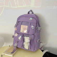 Purple high school rucksack with padded straps for comfortable book carrying between lessons.