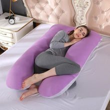Purple maternity U pillow for pregnancy back relief and comfortable positioning during long rest periods.
