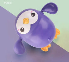 Purple Penguin clockwork wind-up bath toy for kids tub time, water play, and bath fun.