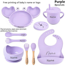 Purple personalised baby utensil set with name print, a thoughtful crab plate gift for new families.