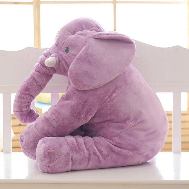 Purple plush elephant toy shown in a sitting position, a baby sleeping back cushion for naps and play.