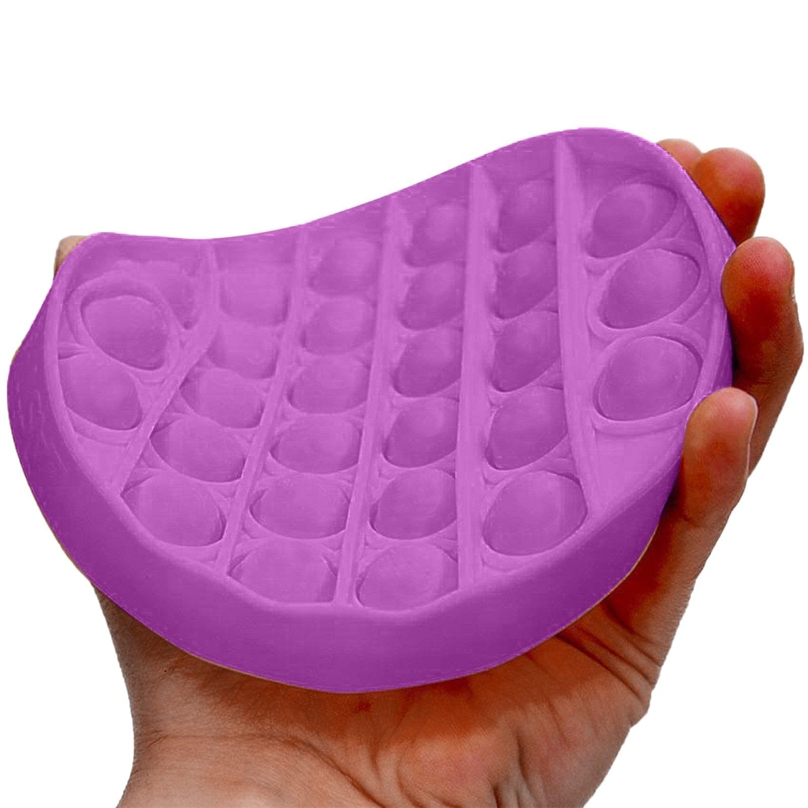 Purple push pop silicone mold with grid pattern shown in hand for sensory stress relief.