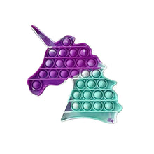 Purple and teal unicorn shaped push pop bubble sensory toy for playful stress relief.