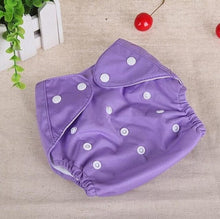 Purple Washable Reusable Nappy cotton training pant for daily baby changes and gradual potty training steps.