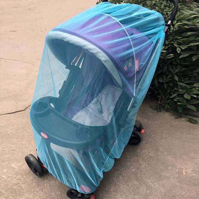 Blue stroller covered with the elastic-edge mosquito mesh for secure bug protection during outdoor naps.