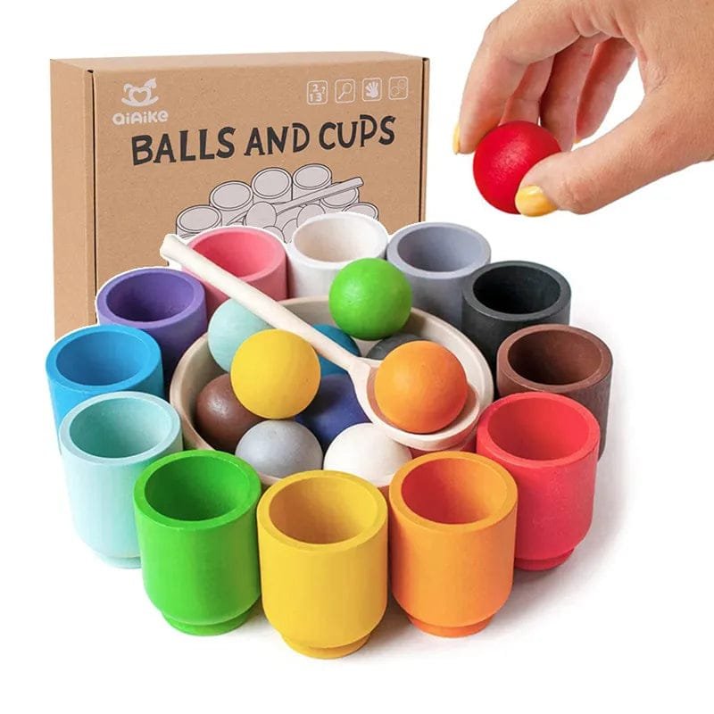 Rainbow Ball and Cups Montessori wooden sorting toy in use for colour matching practice and toddler fine motor play.