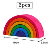 Set of six colorful wooden rainbow blocks with measurements.