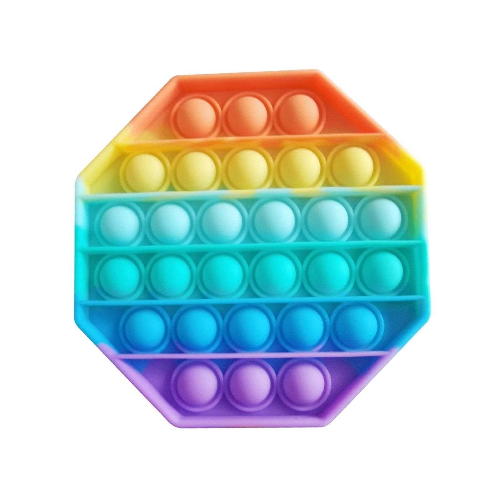 Rainbow hexagon push pop bubble sensory toy for tactile stress relief and focus.