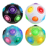 Four colorful puzzle balls.