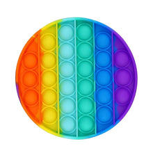 Rainbow push pop bubble sensory toy round design for calming, repetitive fidget play.