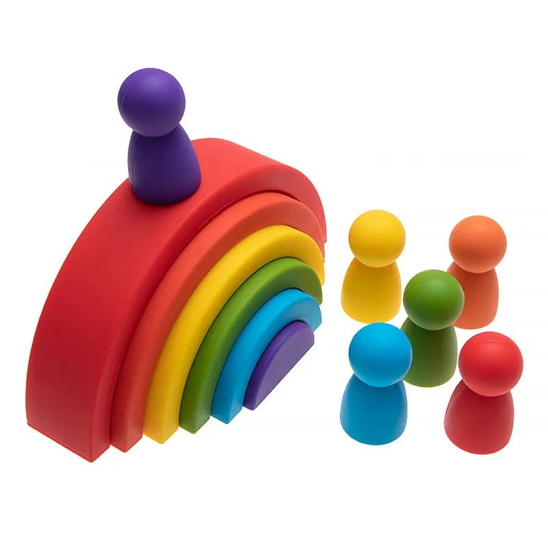 Rainbow Silicone Blocks baby toy with mini peg figures for storytelling play, sorting practice, and nursery learning.