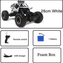 RC off-road truck starter set with remote, battery and USB charger for quick recharging between racing sessions.