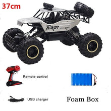 Boxed RC truck gift set with charger, remote and foam tray, ready to give for birthdays and holidays.