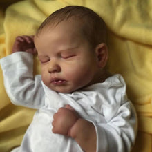 Realistic 50cm LouLou Reborn Baby Doll with soft cloth body for lifelike pretend play, cuddling, and reborn doll collecting.